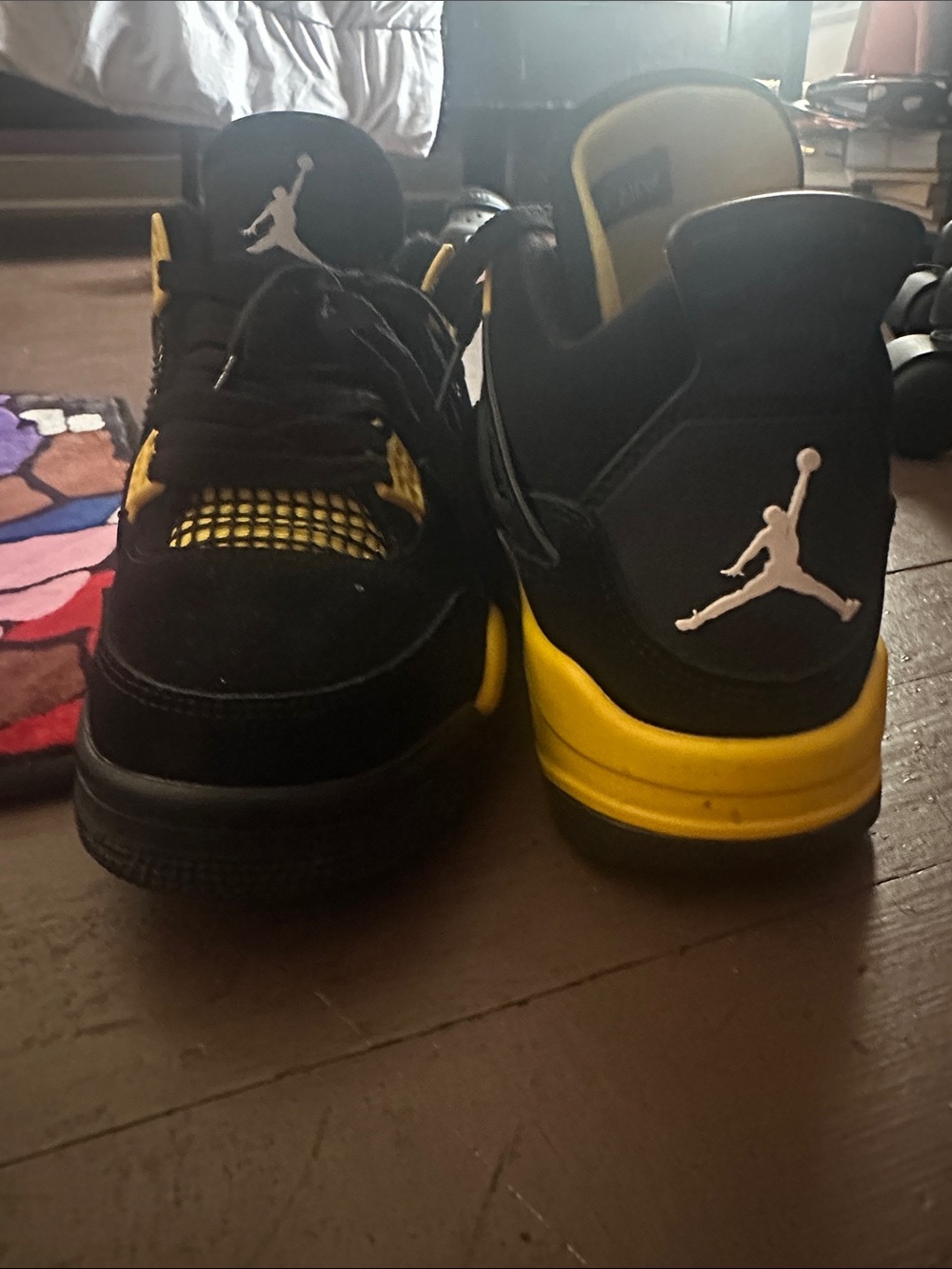 Jordan 4 Black and Yellow Thunders reps